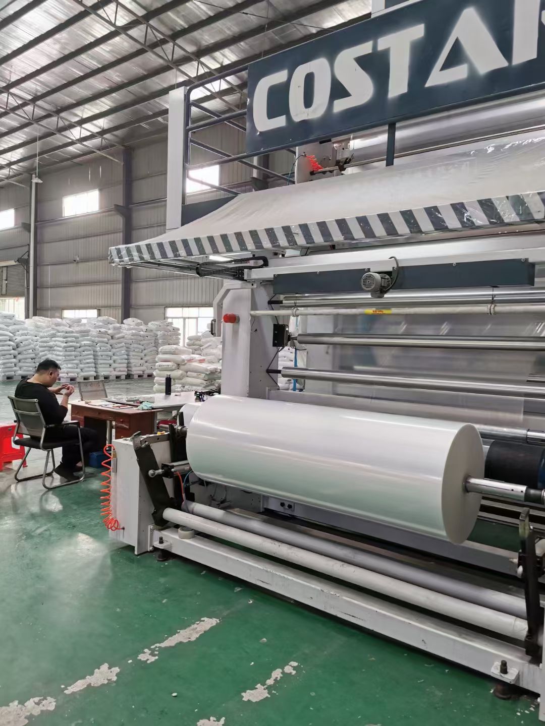 Coating and rewinding line